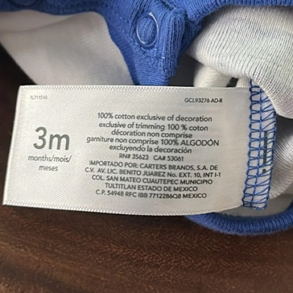 Carter’s snap front shark bodysuit